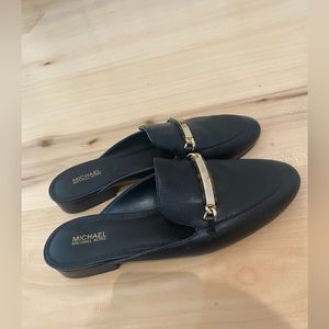 Micheal kors slide on loafer style.